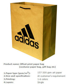 Glossy cardboard luxury paper garment carrier bag wholesale,Medium luxury shopping paper carrier gift bag wholesale